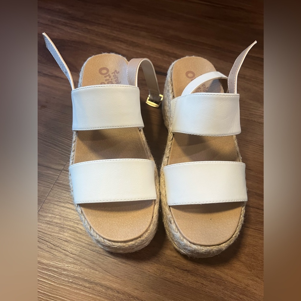 Chunky white platform sandals